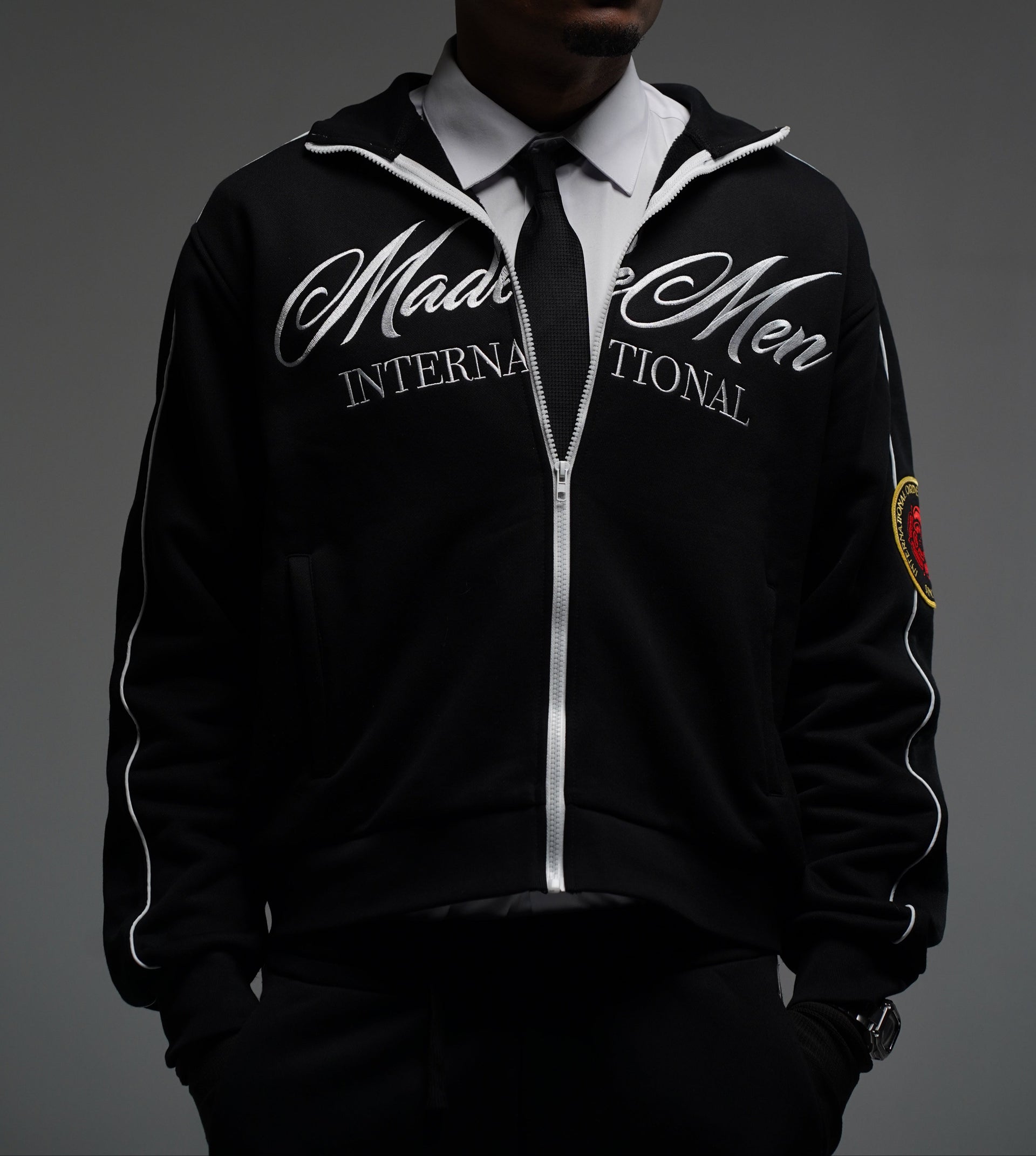 ESSENTIALS TRACK JACKET